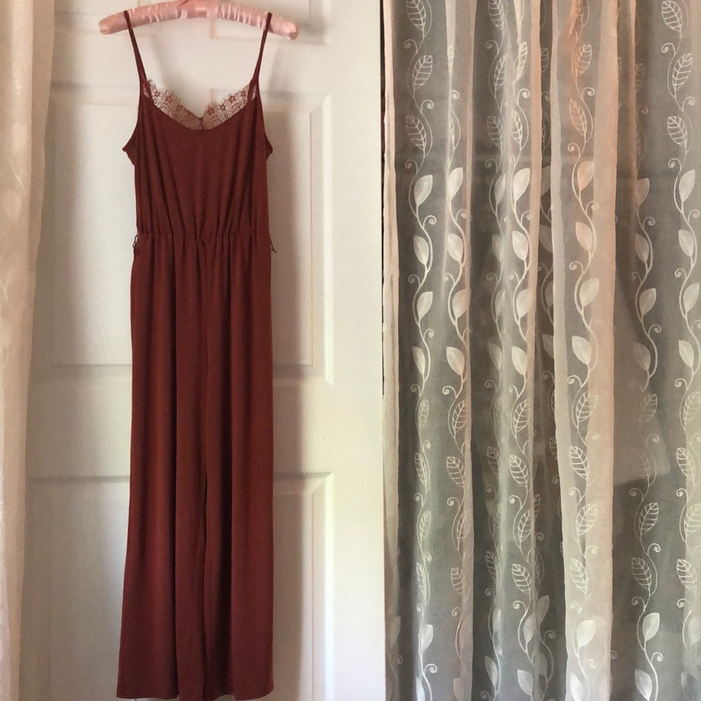 Express jumpsuit, adjustable shoulder straps, missing belt